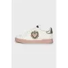 Leather sneakers with decorative elements