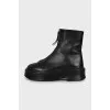 Leather boots decorated with lightning