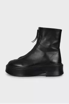 Leather boots decorated with lightning