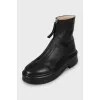 Leather boots decorated with lightning