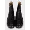 Leather boots decorated with lightning