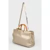 Leather bag with beige handle