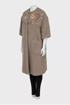 Brown coat decorated with embroidery