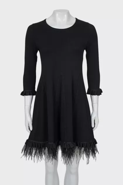 Dress decorated with feathers