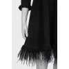 Dress decorated with feathers