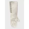 White leather gloves