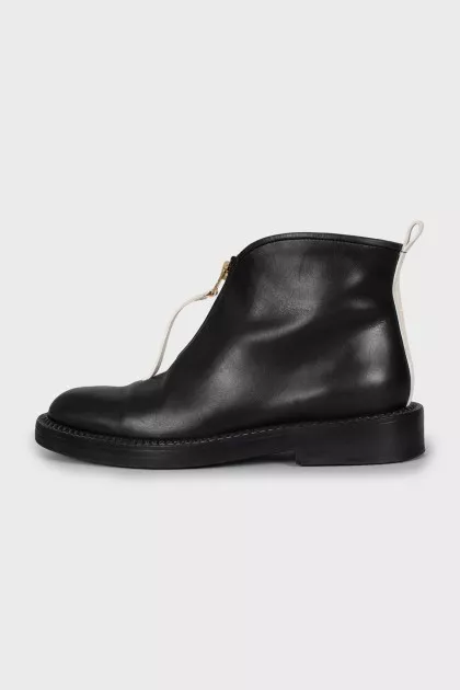 Leather boots decorated with lightning