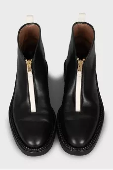 Leather boots decorated with lightning
