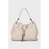 Leather bag with magnetic clasp