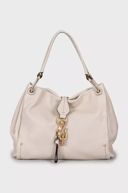 Leather bag with magnetic clasp