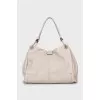 Leather bag with magnetic clasp