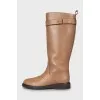 High boots made of brown leather