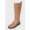 High boots made of brown leather