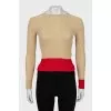 Jumper decorated with red stripes