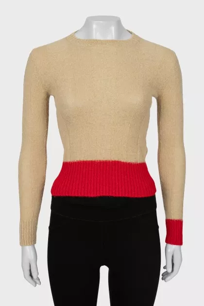 Jumper decorated with red stripes