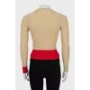 Jumper decorated with red stripes