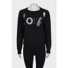 Black jumper with branded embroidery
