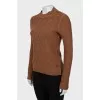 Knitted sweater in brown color