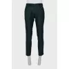 Men's green trousers with arrows