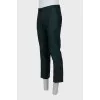 Men's green trousers with arrows