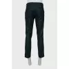 Men's green trousers with arrows