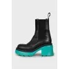 Leather boots with accent sole