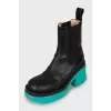 Leather boots with accent sole