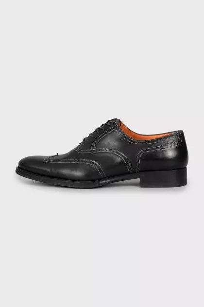 Men's black shoes with perforation