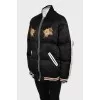 Down jacket decorated with stripes