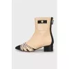 Leather ankle boots with signature decor