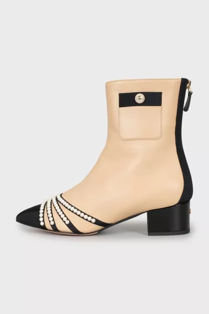 Leather ankle boots with signature decor