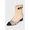 Leather ankle boots with signature decor