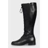 Black boots made of textile and leather