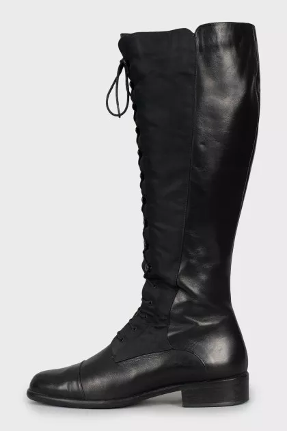 Black boots made of textile and leather