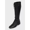 Black boots made of textile and leather
