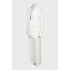 White suit with accent stripes