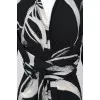Black and white dress with a wide belt