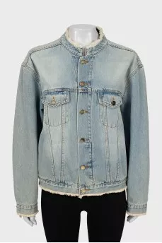 Denim jacket with raw edges
