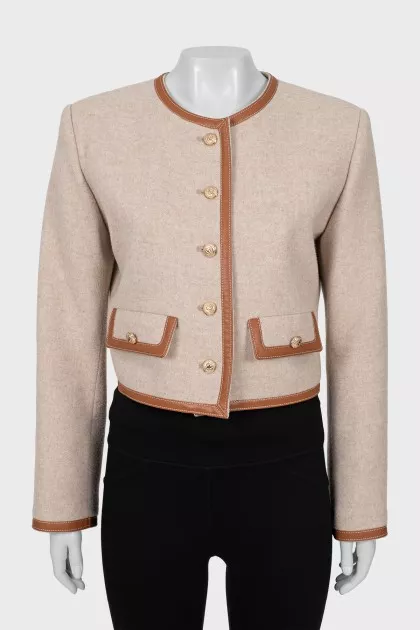 Wool jacket with gold fittings
