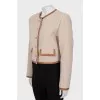Wool jacket with gold fittings