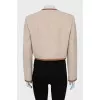 Wool jacket with gold fittings