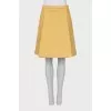 Fitted skirt with tag