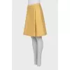 Fitted skirt with tag