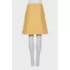 Fitted skirt with tag