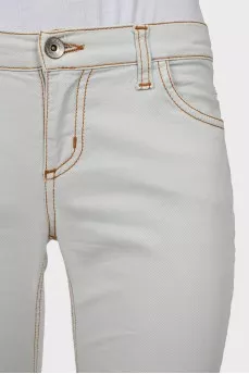 Light-colored low-rise jeans