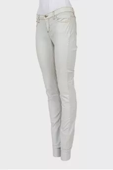 Light-colored low-rise jeans