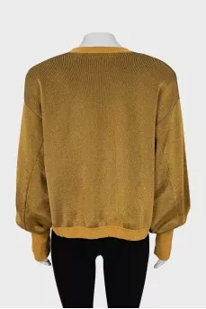 Gold colored sweater