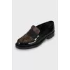 Patent leather loafers with signature print