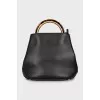 Leather bag with accent handle