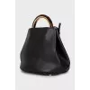 Leather bag with accent handle